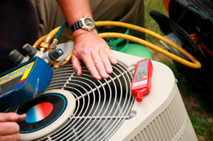 Technician performing heat pump service