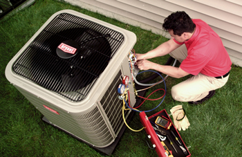 Technician providing air conditioning service