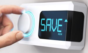 Digital thermostat that reads "SAVE"