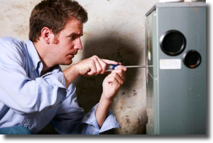 Technician inspecting a heating system